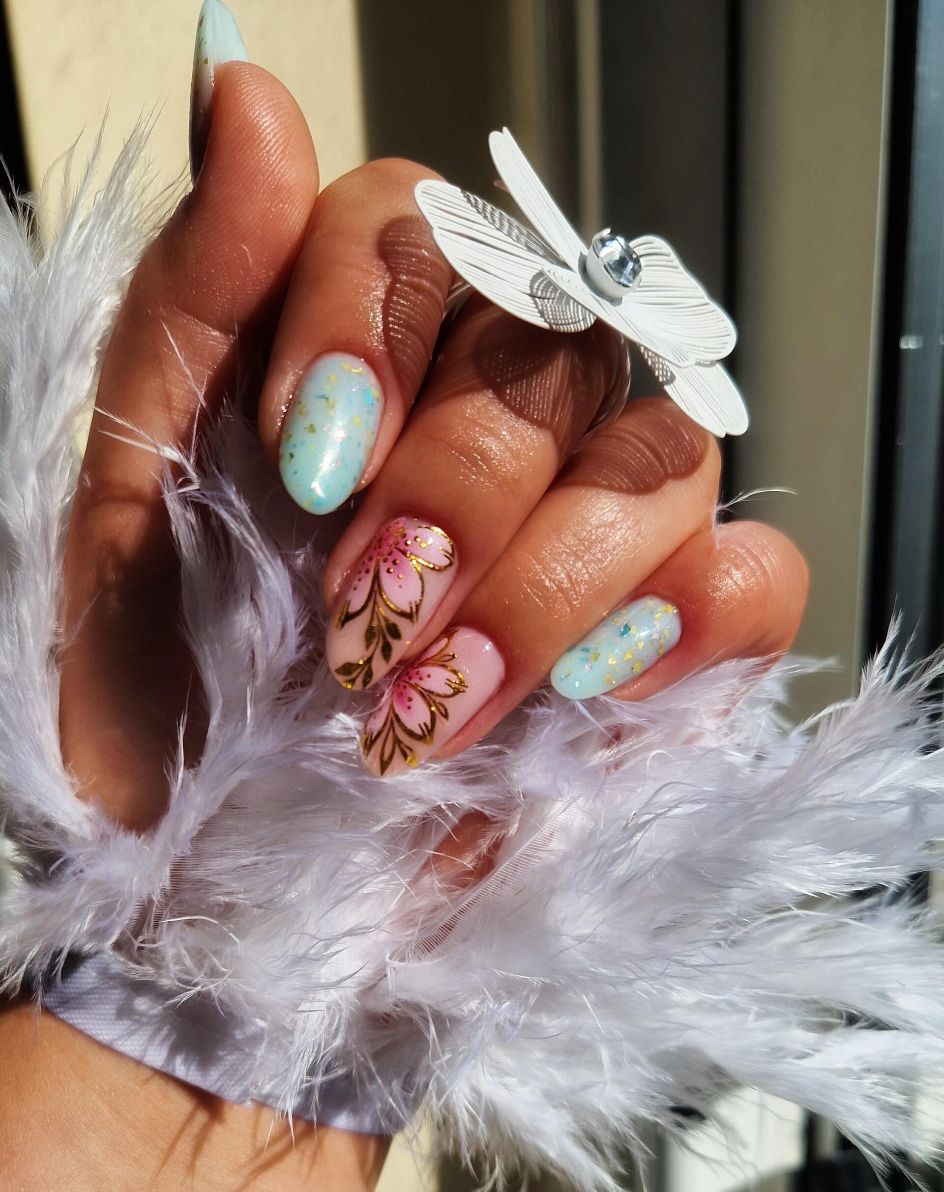 A pop of pastel combined with intricate gold detailing